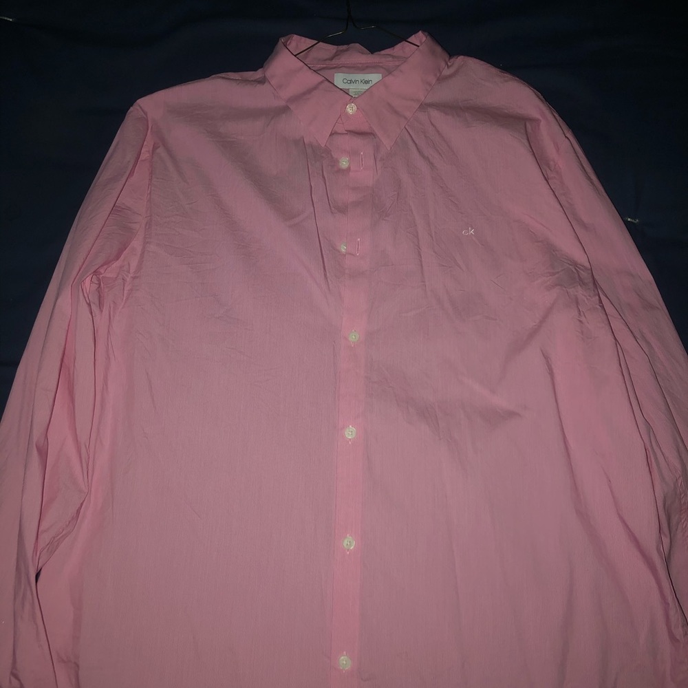 Pink button down Calvin Klein shirt